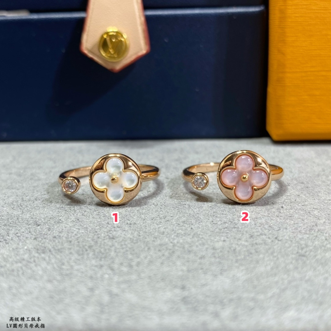 l0*is V*t0n round mother-of-pearl ring