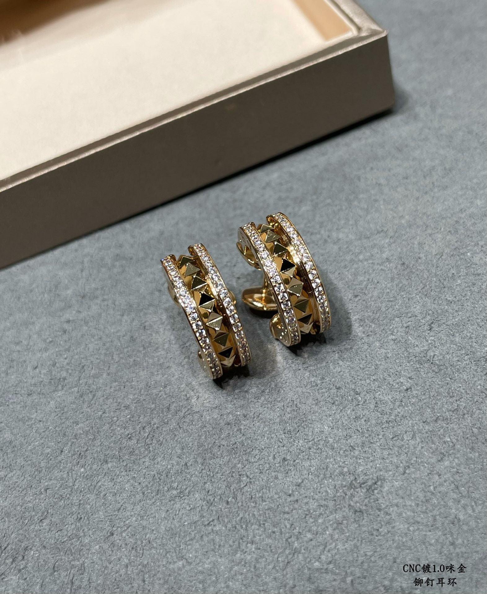 B*l*ai drill rivets on both sides earrings