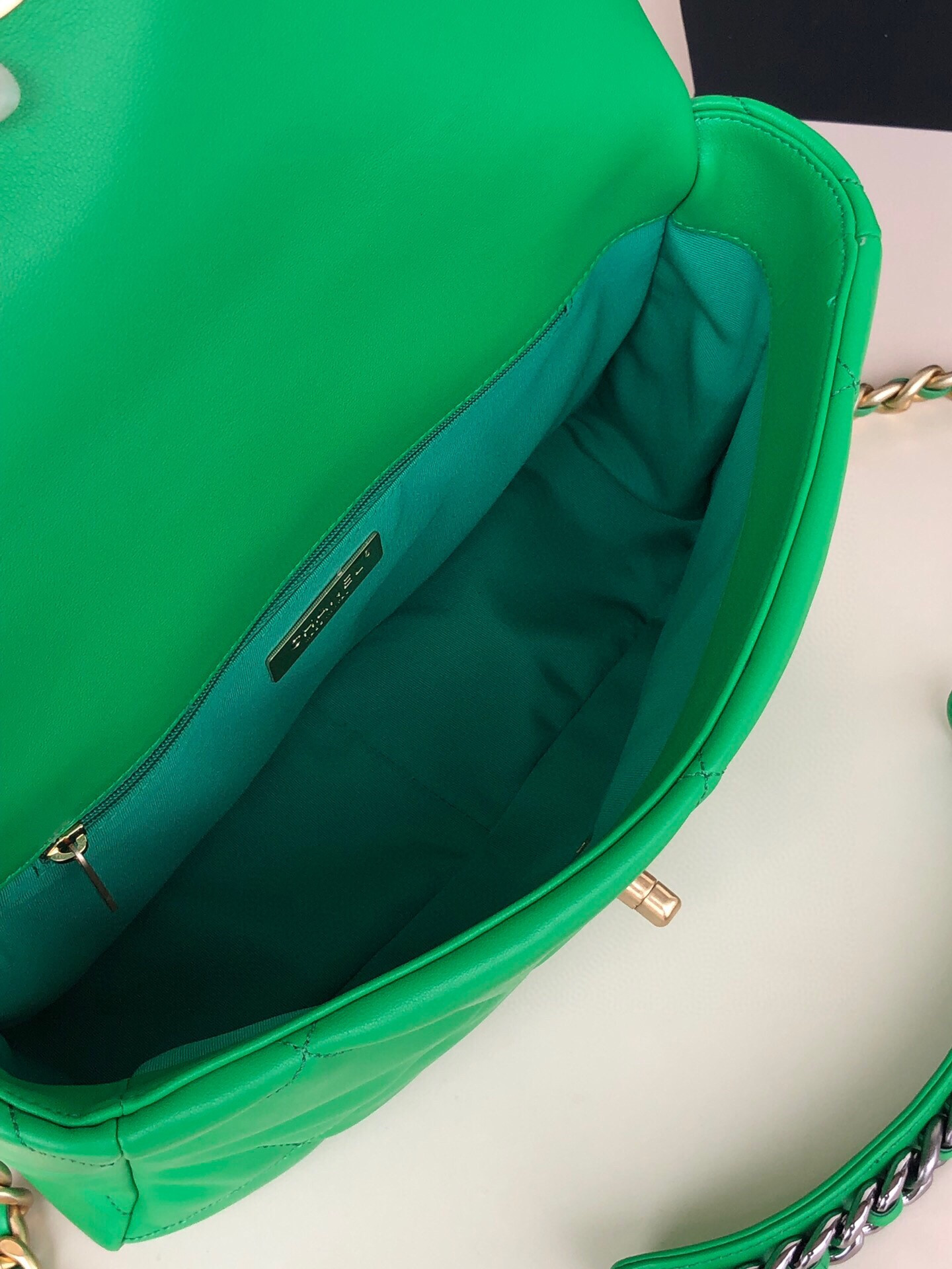 Ch*el 19 large handbag shiny leather, gold-tone, silver-tone & ruthenium-finish metal green 7.8 × 11.7 × 3.9 in