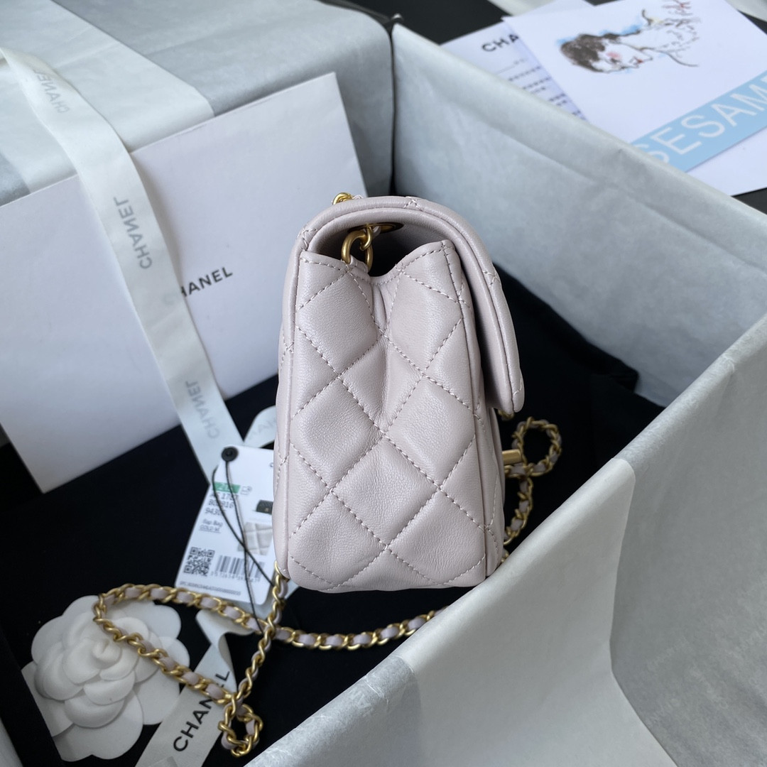 Ch*el mini flap bag shiny calfskin & gold-tone metal light pink 4.7 × 7.8 × 2.3 in