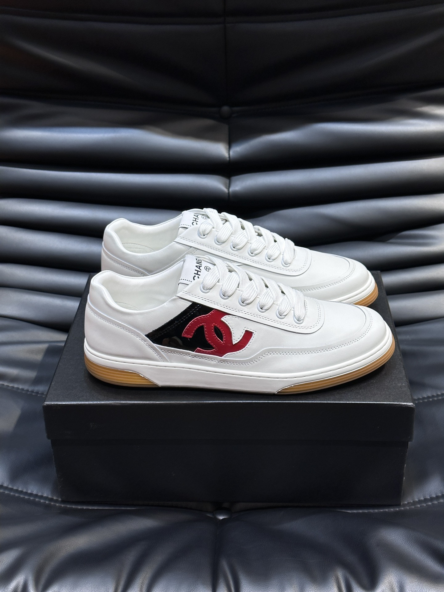 ua Ch*el sneaker calfskin