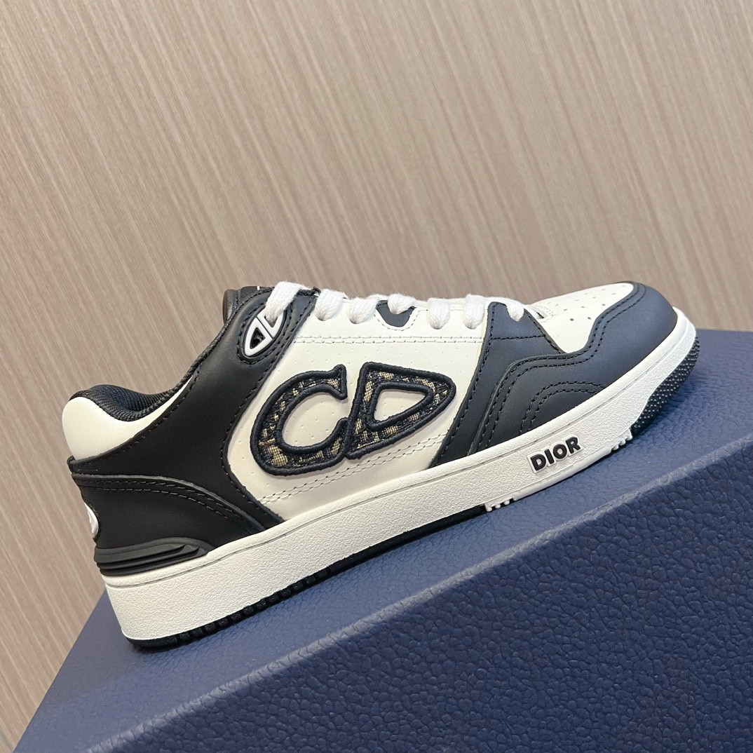 ua D*or b57 low-top sneaker black and white